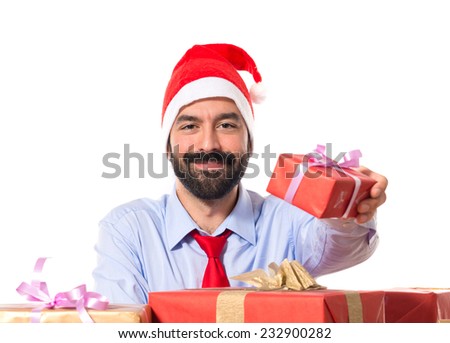 Christmas man with gifts over white