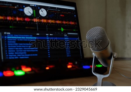 Hobby: home DJ studio: microphone and laptop