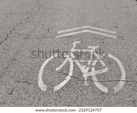 A close view of the painted bike lane on the road.