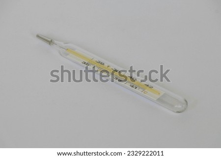 Mercury thermometer, isolated on a white background