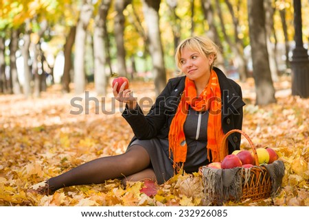 pregnant woman in autumn park