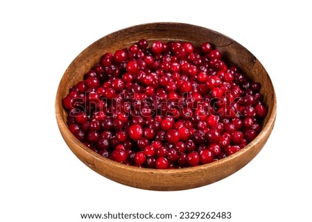 Red Cranberry berry in a wooden plate. High quality Isolate, white background