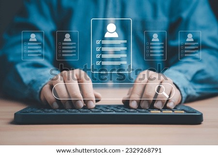 Headhunter using computer to check and select the optimum resume application form , Human development and recruitment to interview and join with company concept. Royalty-Free Stock Photo #2329268791