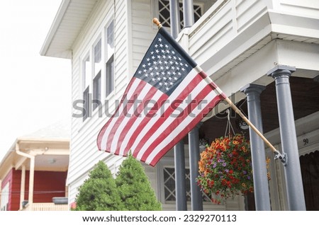  US flag waving proudly, representing patriotism and the spirit of American holidays, evoking a sense of national pride and unity