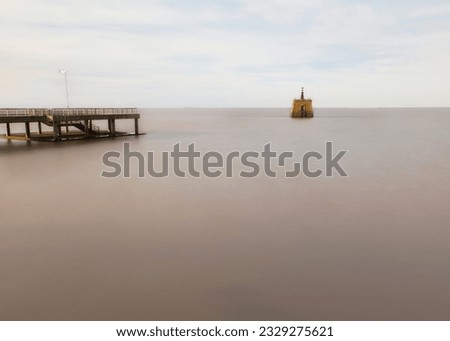 dock fishermen resting in the water