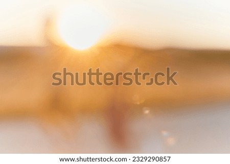 The mesmerizing beauty of a hazy sunrise, as the early morning mist diffuses the golden rays of light, creating an ethereal and enchanting landscape that evokes a sense of tranquility and serenity. Royalty-Free Stock Photo #2329290857