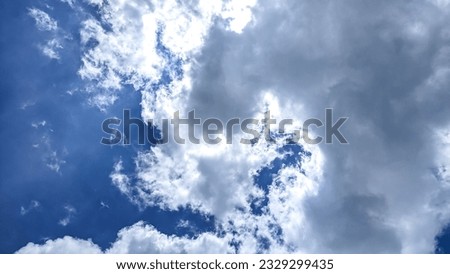 Blue sky with clouds in summer. Background clear and cloudy in sunlight, calm and bright winter air. Gloomy dazzling blue landscape in surroundings day horizon skyline view spring wind