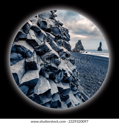Picture in a circle on black background. Spherical image of Reynisdrangar cliffs in Atlantic ocean. Spectacular summer scene of black sand beach in Iceland, Vik location. View through the spyglass.
