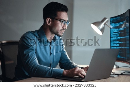 Laptop, screen and business man for coding, software development and programming script in cybersecurity. Night, computer research and programmer or IT person with html code, system or data analysis Royalty-Free Stock Photo #2329333325
