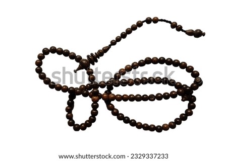 Tasbih oud solid wood for pray to allah to muslim religion Royalty-Free Stock Photo #2329337233