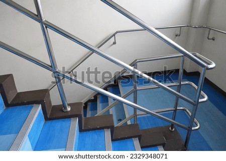 stainless steel railing Stairs, stainless steel handrails Royalty-Free Stock Photo #2329348071