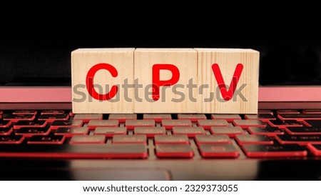 CPV cost per view. Letters of the word CPV on wooden blocks isolated on the laptop keyboard
