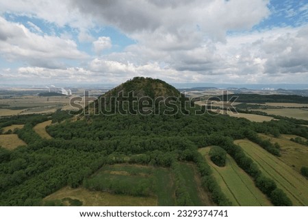 Ceske Stredohori hill range-Central Bohemian Uplands or Central Bohemian Highlands and protected landscape,aerial scenic panorama mountains view,Mila hill,Czech republic by Louny Town,Europe