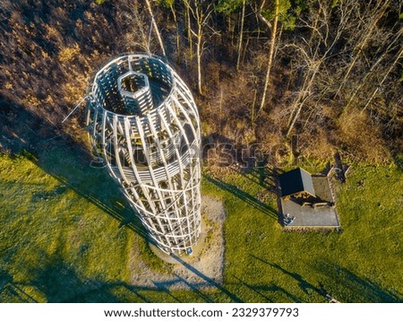 Wooden lookout tower in Hermanice on sunny spring day, Czech Republic. Aerial view from drone. Royalty-Free Stock Photo #2329379793