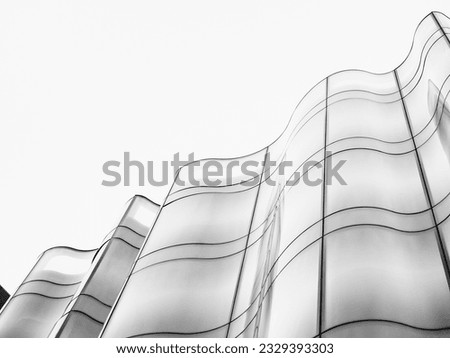 Architecture details wall curve Glass facade reflection Abstract background Royalty-Free Stock Photo #2329393303