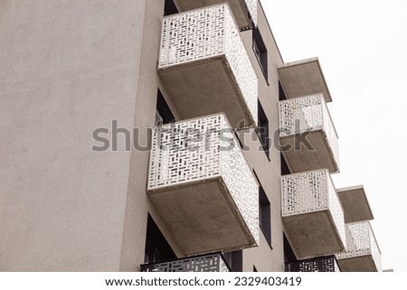 Balconies made of metal panels in different colors.  A simple, lightweight option.  Details of modern architecture