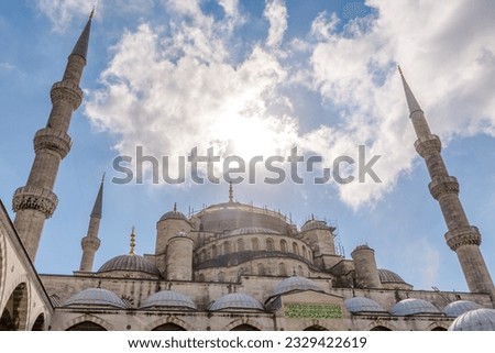The Blue Mosque in Istanbul with written sentence keep the praying from Quran on green picture  , Istanbul, Turkey