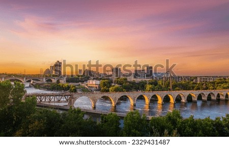 Minneapolis Minnesota at Sunset on the Mississippi River, Royalty-Free Stock Photo #2329431487