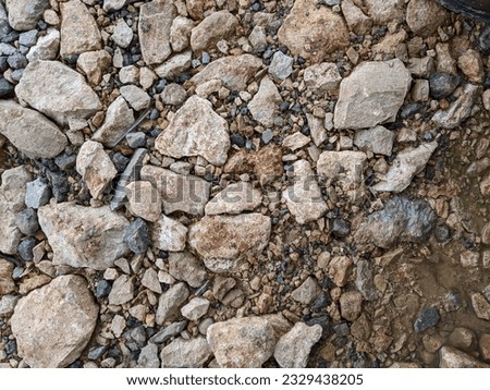 Fragments of mountain stones that have been flattened into a stretch of land.