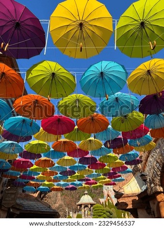 Colorful umbrella in the sky 