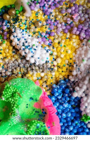 Texture of multi-colored bright shiny balls