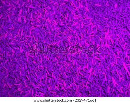 Illuminated pink and purple cat litter