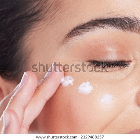 Skincare, closeup and woman with cream on face, anti ageing and collagen treatment for skin glow. Dermatology, cosmetics and morning beauty routine, facial lotion on model with moisturiser product. Royalty-Free Stock Photo #2329488257