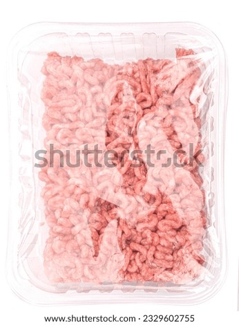 Raw minced meat in a transparent plastic container, isolated. A packshot photo for package design. 