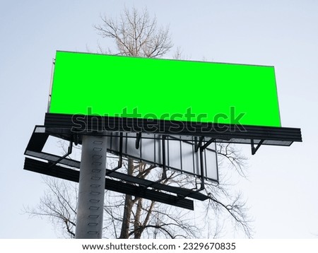 Billboard with green area to be replaced with custom text or image