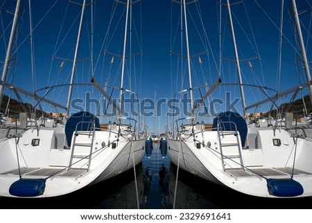 boats anchored in a harbour on a sunny day