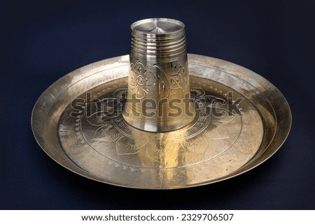 decorated, carved bronze Plate for taking meal. once it ws popular serving plate or dish in Bangladesh and indian royal family. food grade kansa plate or thali and glass or water pot.