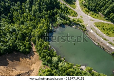 Amazing bird's-eye view of the lake located under the quarry.