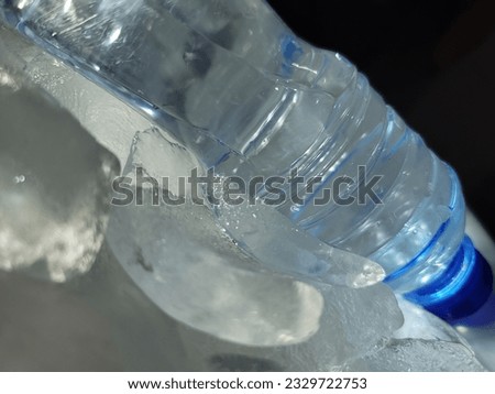  bottled water with ice cubes