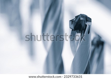 Industrial metalworking concept, milling cutter, metal cutter close up CNC cutters for metal. industry metal processing concept background Royalty-Free Stock Photo #2329733631