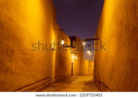 Diriyah old town traditional street illuminated at night, Riyadh, Saudi Arabia Royalty-Free Stock Photo #2329735401