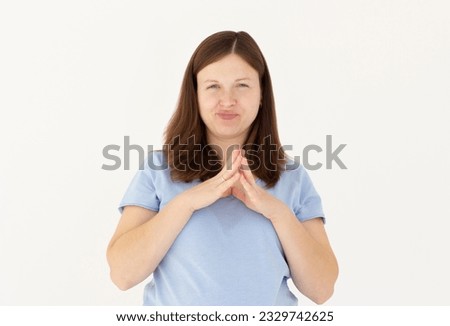 Photo portrait of evil genius woman scheming with fingers touching isolated on white background