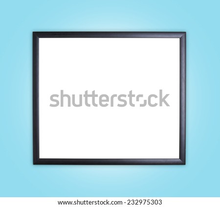 Copyspace empty wooden picture frame composition over the blue surface as a background clip-art composition