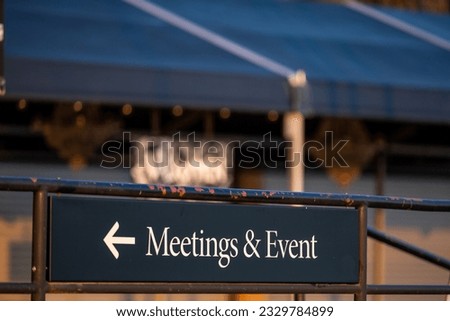 Stockholm, Sweden A sign with an arrow points to  Meetings and Events