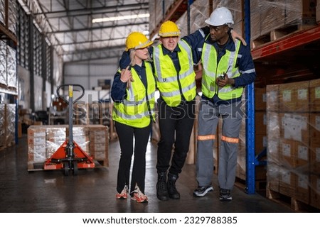 Factory worker helping friend  who have leg injured  accident  in workplace ,safe aid before transfer to hospital is factory worker safety concept Royalty-Free Stock Photo #2329788385