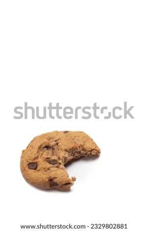 close up of chocolate chip cookie on white background with copy space, bakery, sweet dessert, with bite missing