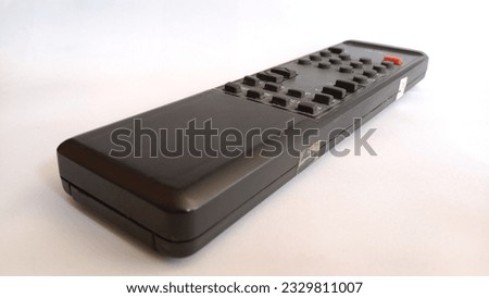 remote control for controlling tv broadcast isolated on white background