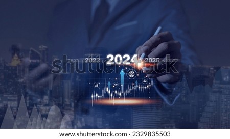Countdown to 2024 concept. the taps a virtual download bar with a loading progress meter on New Year's Eve, turning the year 2024 to 2025. Royalty-Free Stock Photo #2329835503