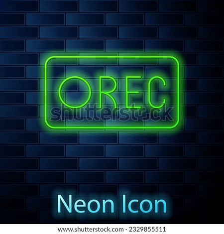 Glowing neon line Record button icon isolated on brick wall background. Rec button.  Vector