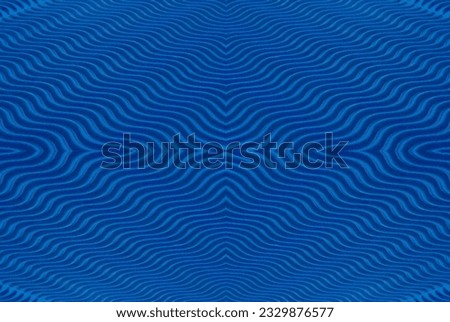 A wavy fluted piece of blue cardboard creates an interesting, hypnotic abstract pattern.