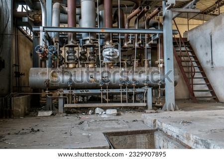 Old factory building from the former GDR with heating technology Lost Places Royalty-Free Stock Photo #2329907895