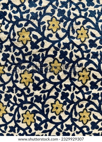 Bohemian vintage pattern on cotton fabric.
Blue, natural and yellow floral pattern.
Floral pattern retro.