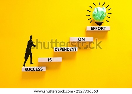 Success and effort symbol. Concept words Success is dependent on effort on wooden block. Beautiful yellow table yellow background. Businessman icon. Business success and effort concept. Copy space.