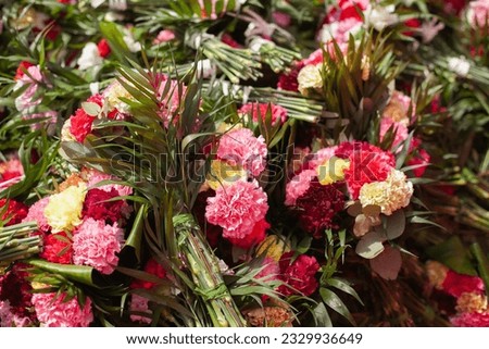 Colorful carnation flowers for traditional religious celebration. Wedding floral decoration.