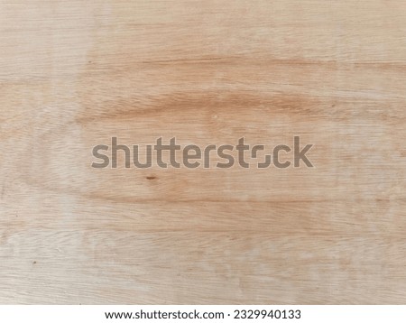 Explore the versatile world of plywood, where the seamless blend of strength, durability, and natural beauty creates endless possibilities for design and construction projects. Royalty-Free Stock Photo #2329940133