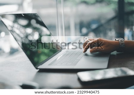 Concept of SEO (search engine optimization) for data searches. Woman's hands typing on laptop keyboard while using web browser to search the internet for information. Royalty-Free Stock Photo #2329940475